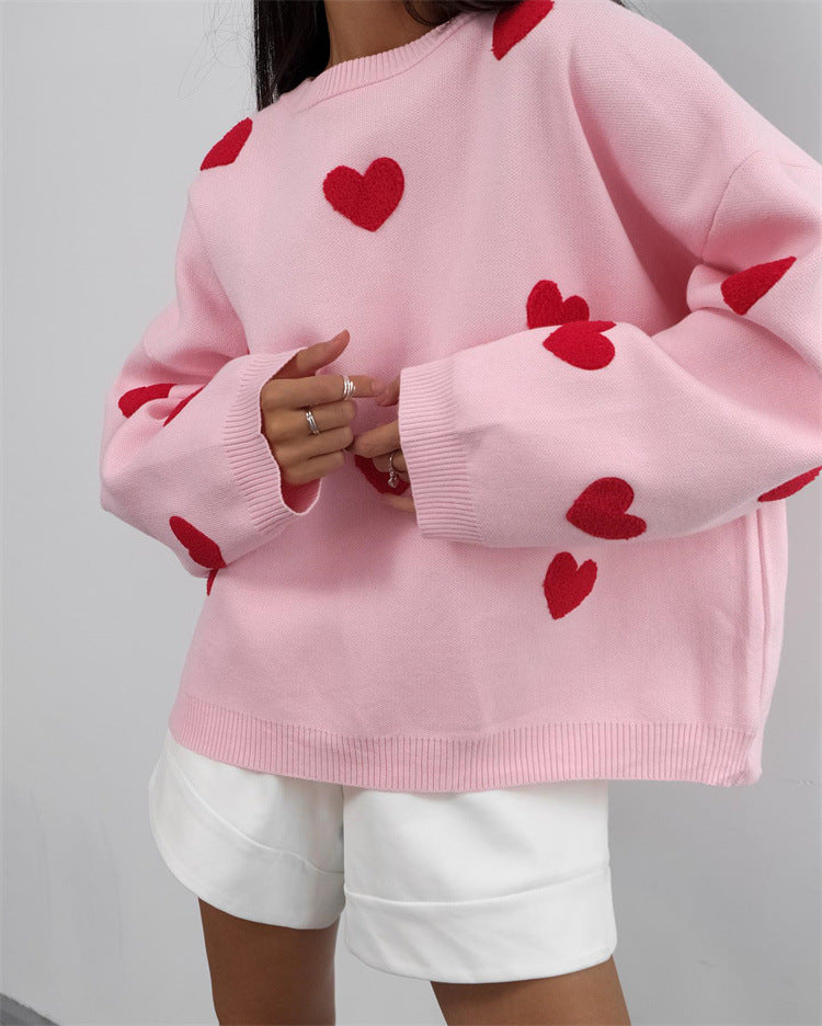 "Valentine's Day Heart Sweater - Women's cozy fashion for celebrating love. Available now in-store!"