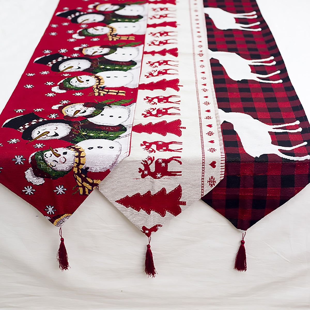 "Elevate your table with festive charm. Shop Christmas table runners for holiday dining perfection!" image 1