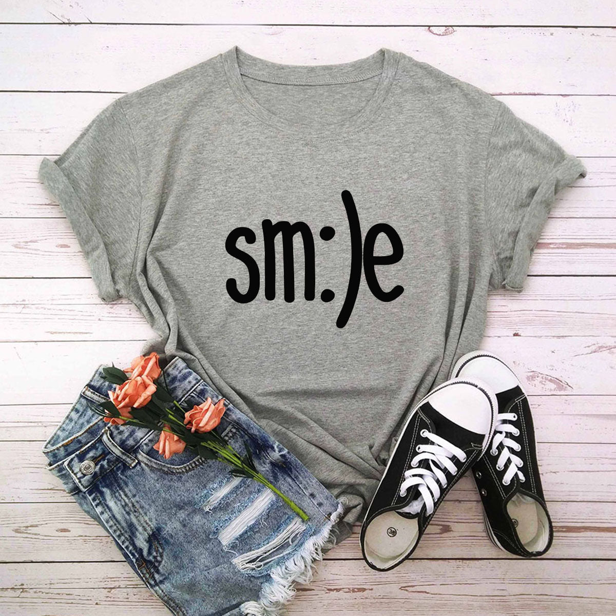 "Radiate positivity with our New Smile Letter Printed T-Shirt for Women. Casual comfort meets joyful style!" image 9