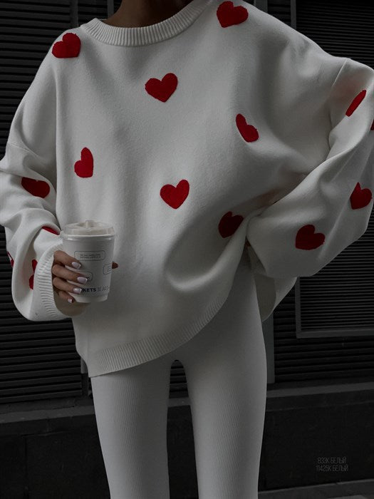 "Valentine's Day Heart Sweater - Women's cozy fashion for celebrating love. Available now in-store!"