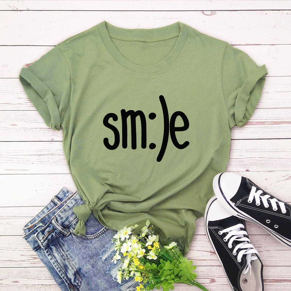 "Radiate positivity with our New Smile Letter Printed T-Shirt for Women. Casual comfort meets joyful style!" image 7