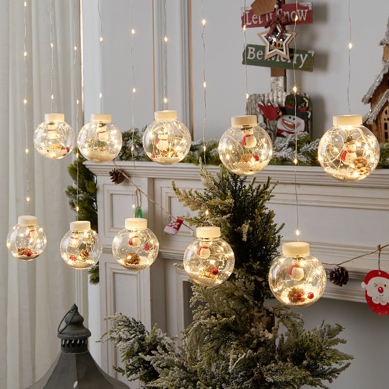 "Festive LED Christmas Curtain Lamp String for charming Christmas window decor. Snowman and Wishing Ball theme." image 8