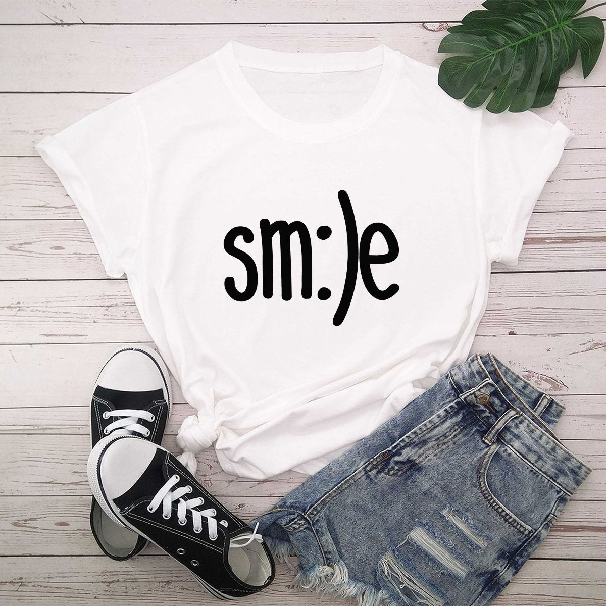 "Radiate positivity with our New Smile Letter Printed T-Shirt for Women. Casual comfort meets joyful style!" image 16