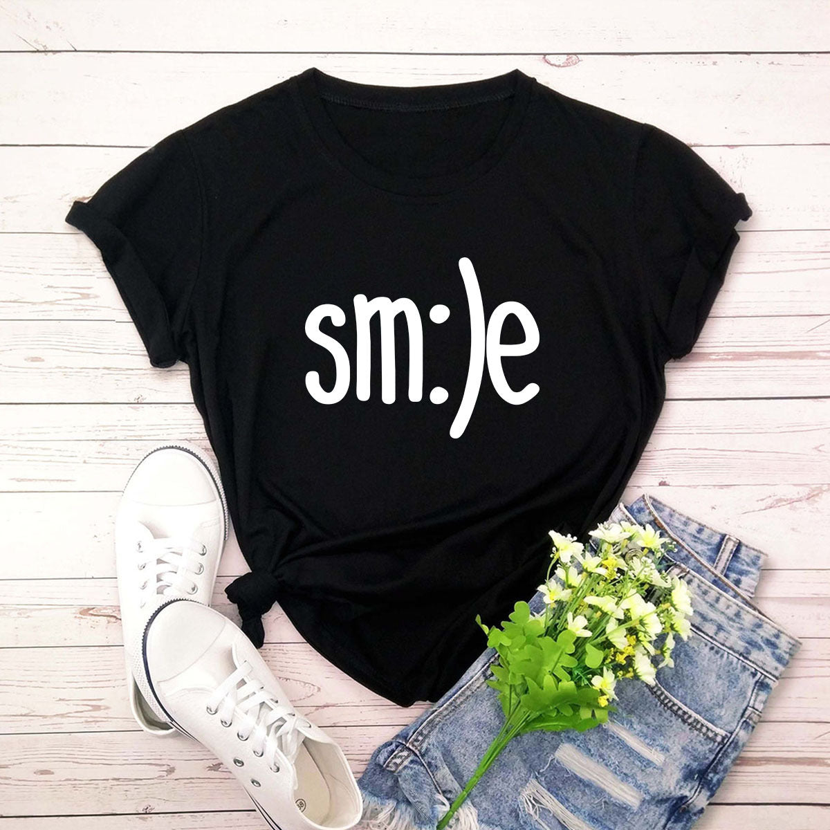"Radiate positivity with our New Smile Letter Printed T-Shirt for Women. Casual comfort meets joyful style!" image 8