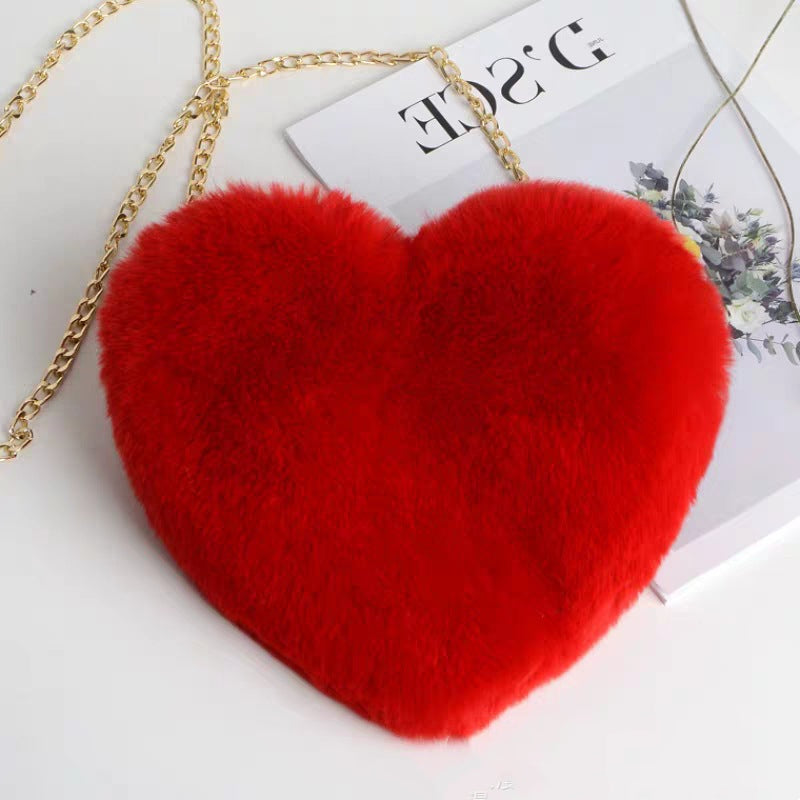 "Elevate your style: Love Bags for Women with plush design and chic chain shoulder strap. "image 4