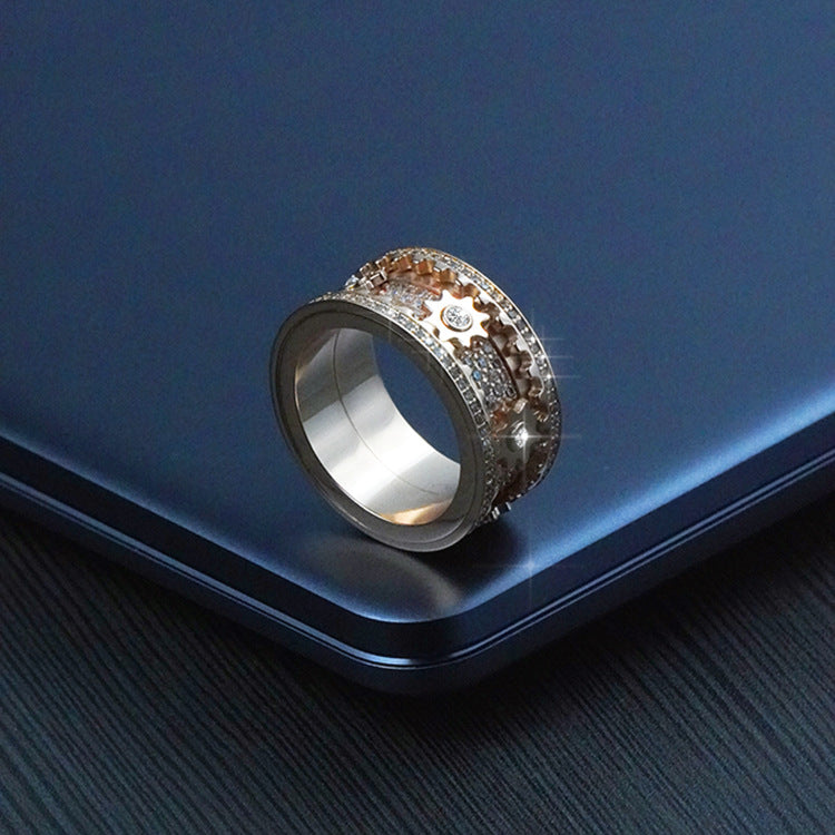 "Dazzle in style with our inlaid stone ring featuring gypsophila diamonds and a trendy rotating gear." image 3