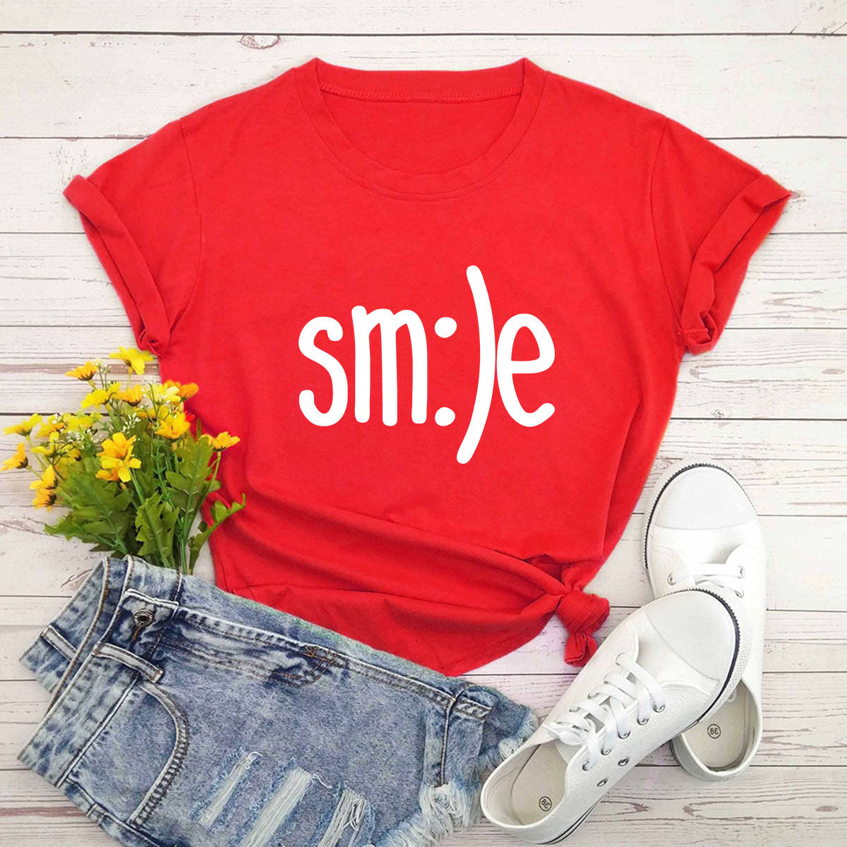 "Radiate positivity with our New Smile Letter Printed T-Shirt for Women. Casual comfort meets joyful style!" image 4