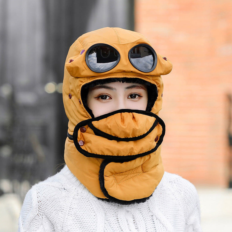 "Stay cozy on winter adventures with our Thermal Trapper Hat featuring built-in glasses. Shop now!" image 8