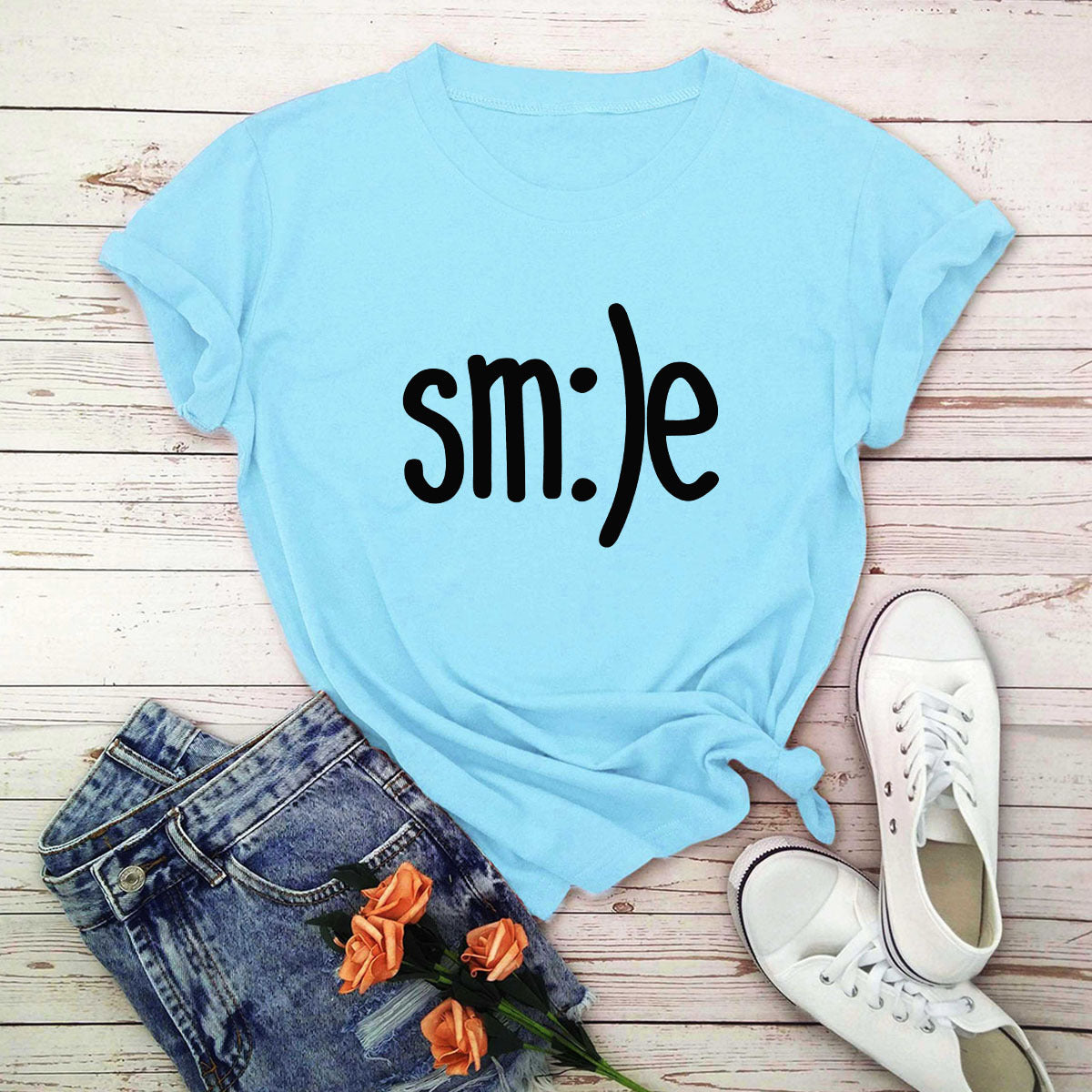 "Radiate positivity with our New Smile Letter Printed T-Shirt for Women. Casual comfort meets joyful style!" image 10