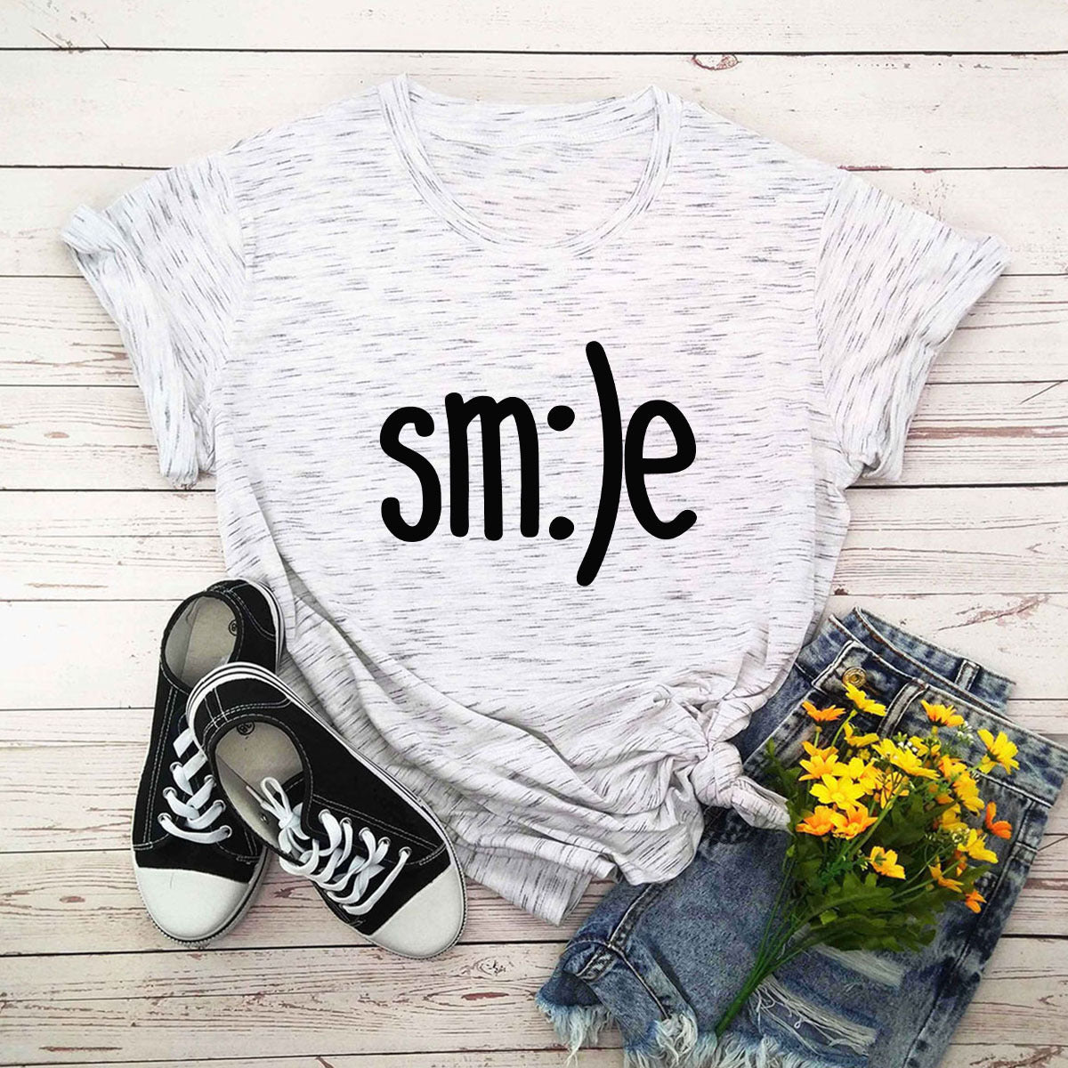 "Radiate positivity with our New Smile Letter Printed T-Shirt for Women. Casual comfort meets joyful style!" image 13
