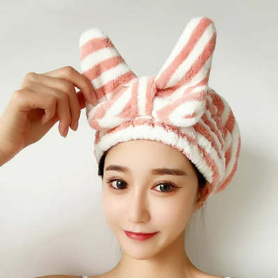 "Upgrade your routine with our chic Hair Drying Bow Shower Cap – ultimate style meets functionality!"