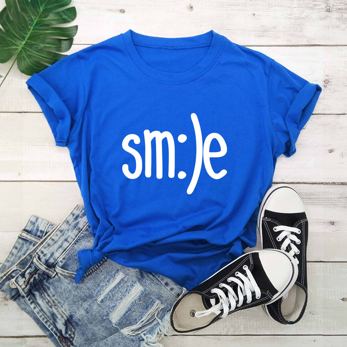 "Radiate positivity with our New Smile Letter Printed T-Shirt for Women. Casual comfort meets joyful style!" image 15