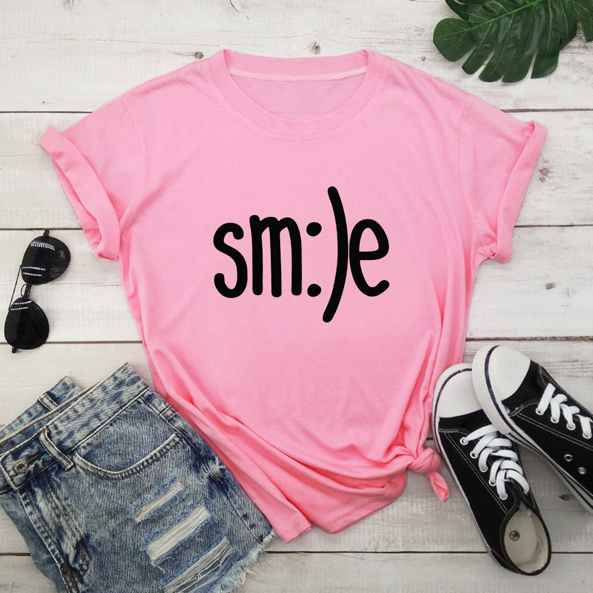 "Radiate positivity with our New Smile Letter Printed T-Shirt for Women. Casual comfort meets joyful style!" image 14