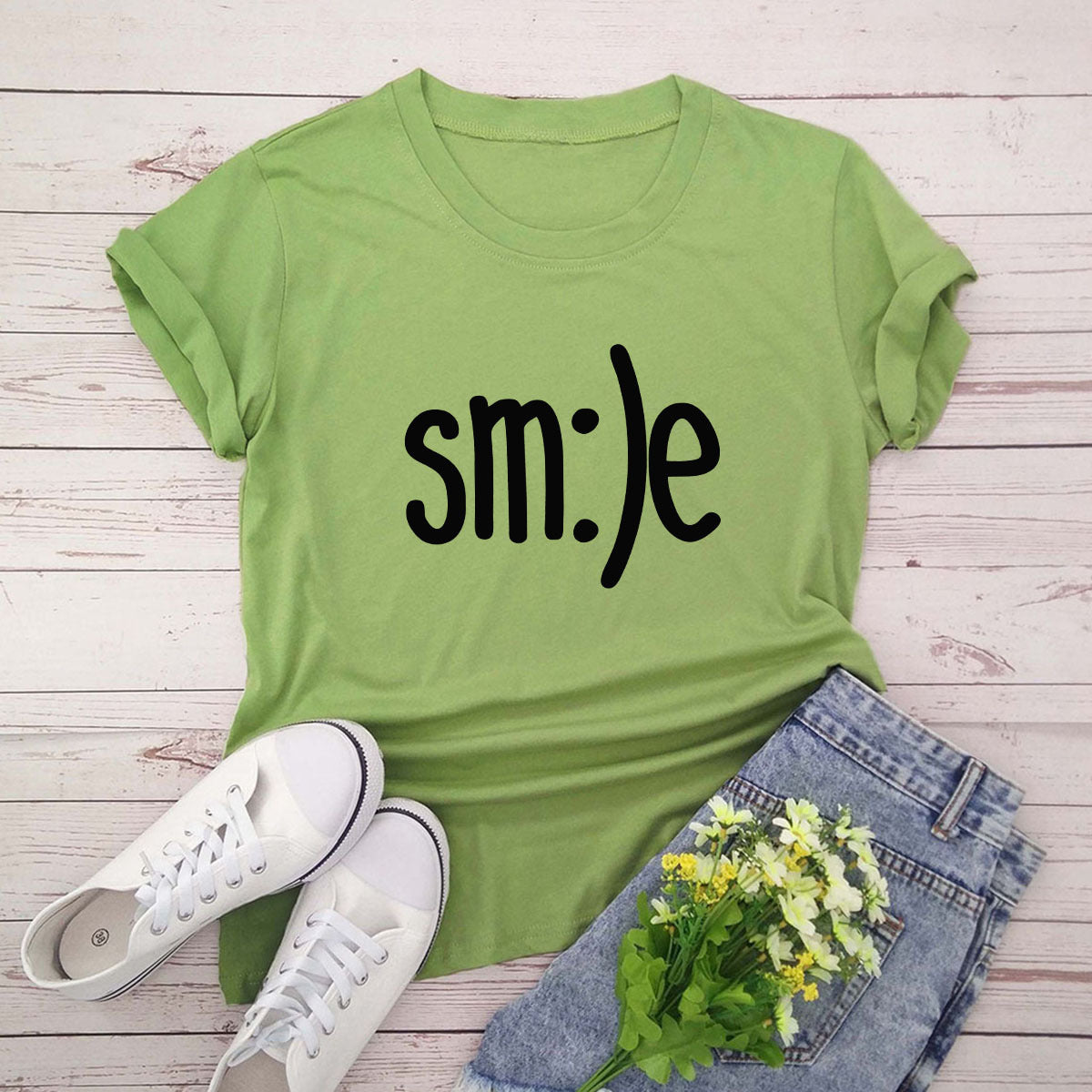"Radiate positivity with our New Smile Letter Printed T-Shirt for Women. Casual comfort meets joyful style!" image 11