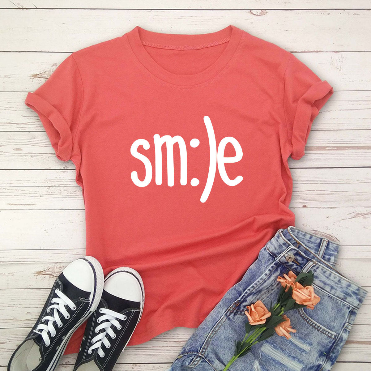 "Radiate positivity with our New Smile Letter Printed T-Shirt for Women. Casual comfort meets joyful style!" image 1