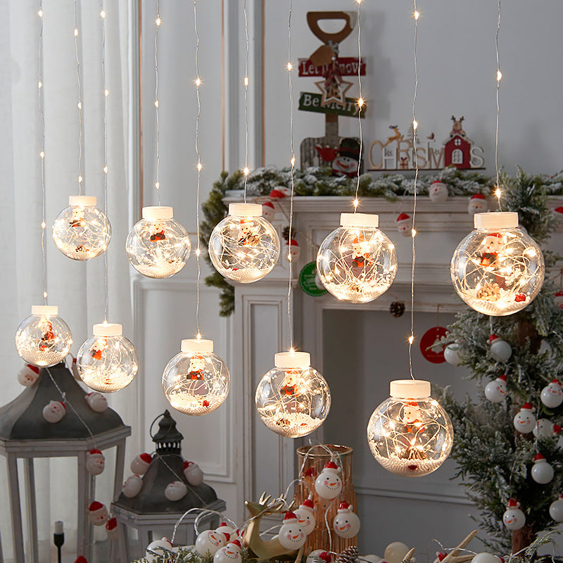 "Festive LED Christmas Curtain Lamp String for charming Christmas window decor. Snowman and Wishing Ball theme." image 4