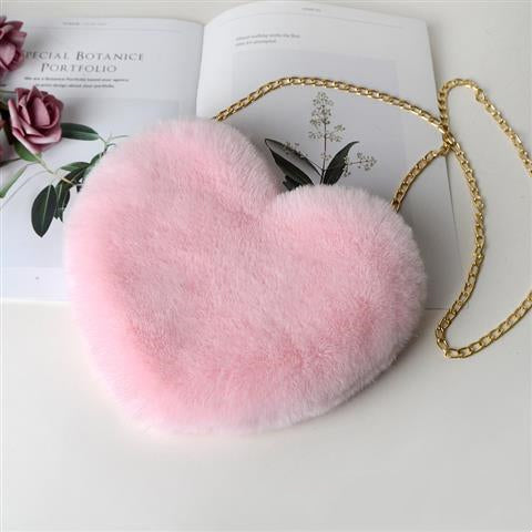"Elevate your style: Love Bags for Women with plush design and chic chain shoulder strap. "image 9
