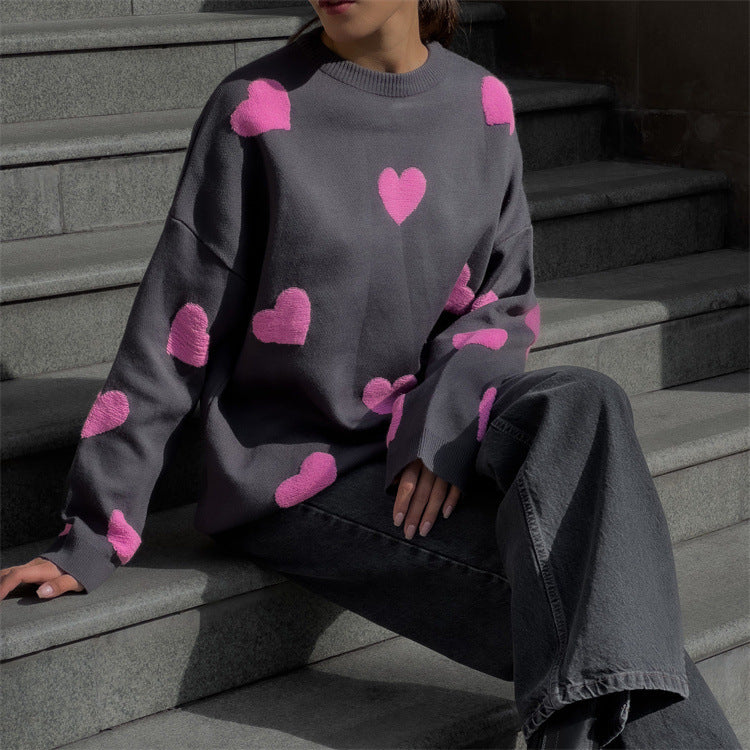 "Valentine's Day Heart Sweater - Women's cozy fashion for celebrating love. Available now in-store!"