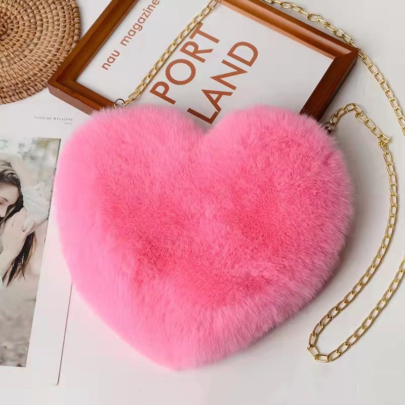 "Elevate your style: Love Bags for Women with plush design and chic chain shoulder strap. "image 7