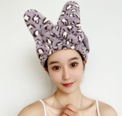 "Upgrade your routine with our chic Hair Drying Bow Shower Cap – ultimate style meets functionality!"