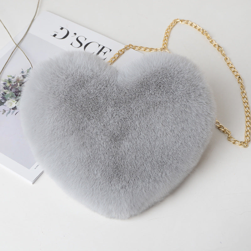 "Elevate your style: Love Bags for Women with plush design and chic chain shoulder strap. "image 10