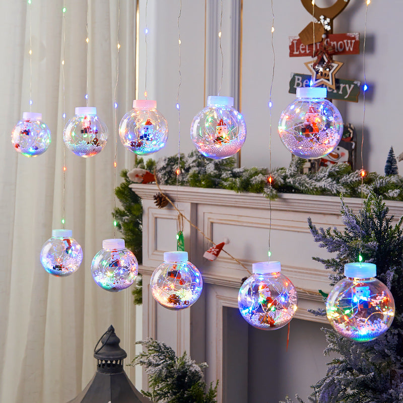 "Festive LED Christmas Curtain Lamp String for charming Christmas window decor. Snowman and Wishing Ball theme." image 10