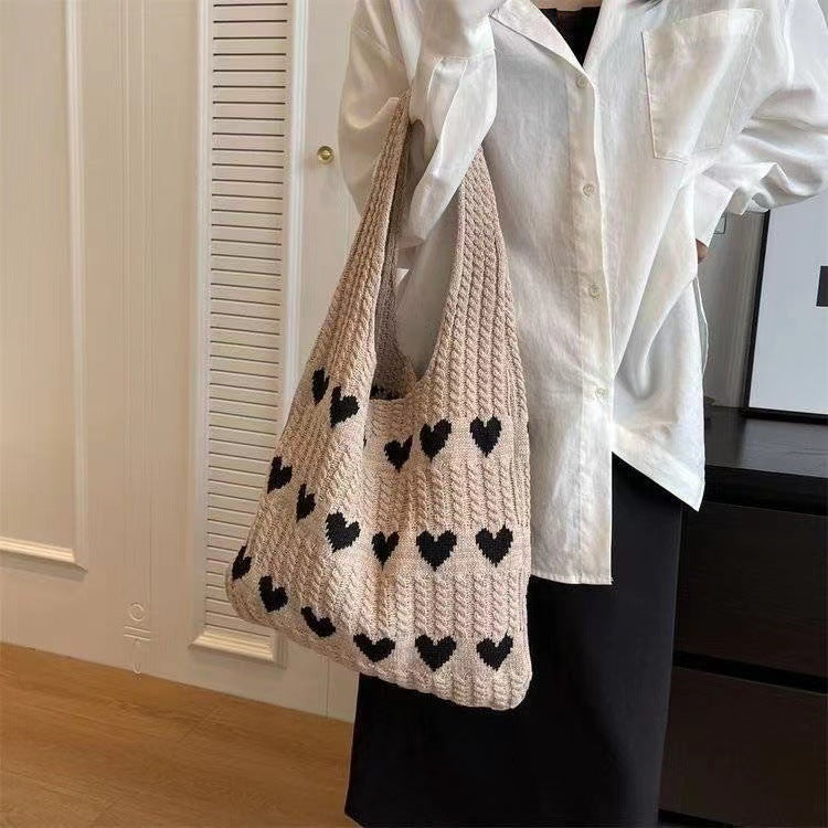 "Chic Heart-shaped Knitted Woven Shoulder Bag – Elevate your style with this trendy side bag."