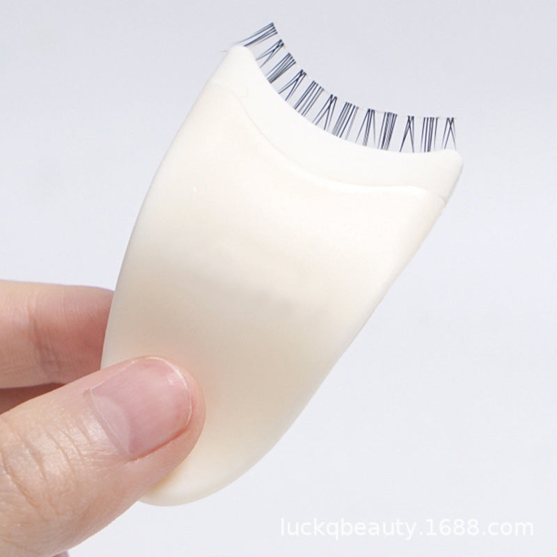 "Image: Plastic Eyelash Curler Stick and False Eyelash Curler Eyelash Aid available in store - find the best eyelash curler for flawless lashes!"