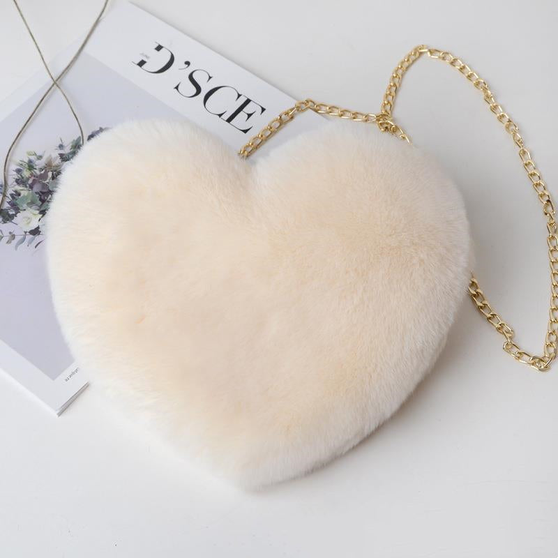 "Elevate your style: Love Bags for Women with plush design and chic chain shoulder strap. "image 6