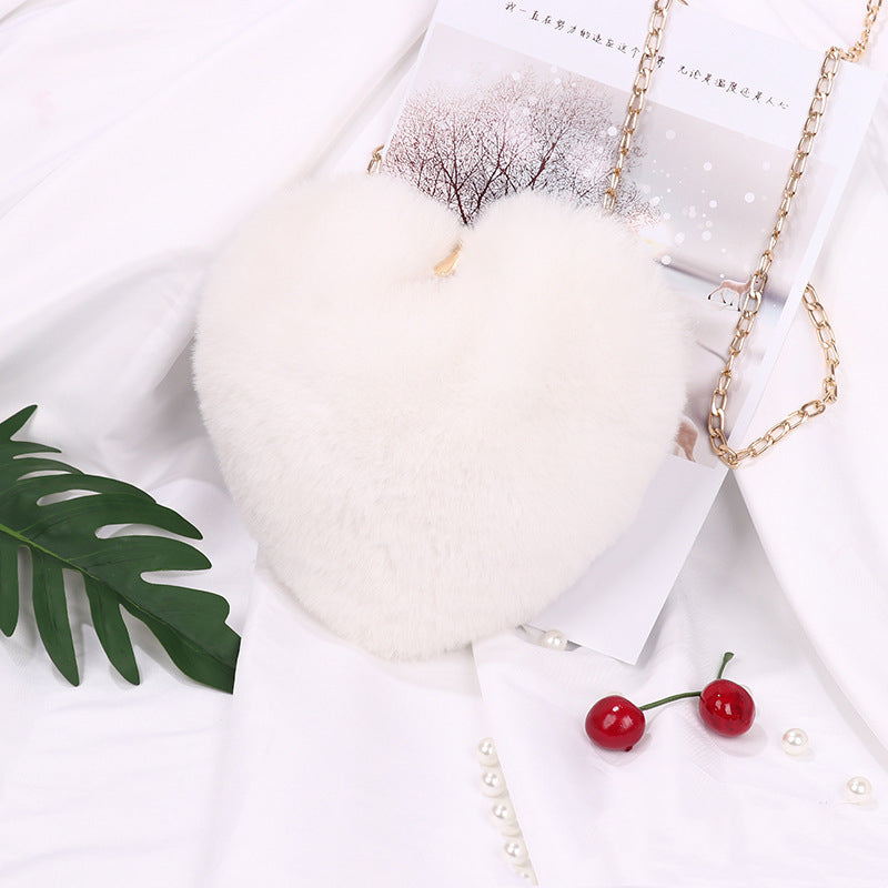 "Elevate your style: Love Bags for Women with plush design and chic chain shoulder strap. "image 12