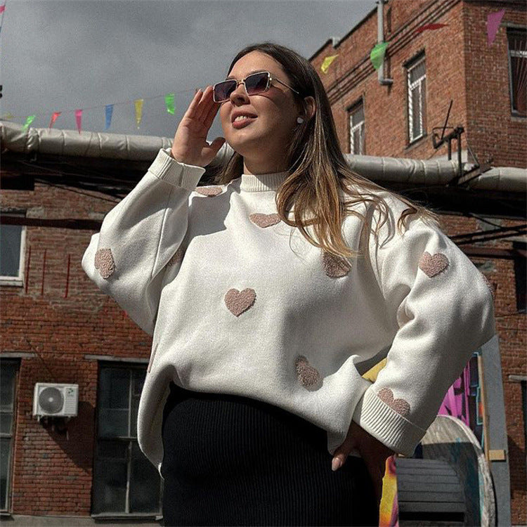 "Valentine's Day Heart Sweater - Women's cozy fashion for celebrating love. Available now in-store!"