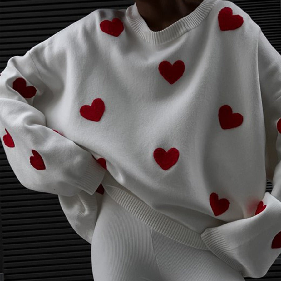 "Valentine's Day Heart Sweater - Women's cozy fashion for celebrating love. Available now in-store!"