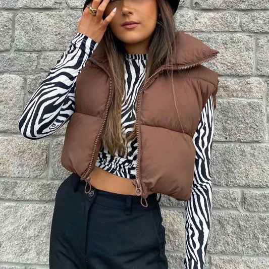  Chic puffer vests for warmth and style—available now in-store. image 1