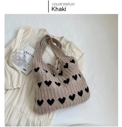  "Chic Heart-shaped Knitted Woven Shoulder Bag – Elevate your style with this trendy side bag."