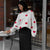 "Valentine's Day Heart Sweater - Women's cozy fashion for celebrating love. Available now in-store!"