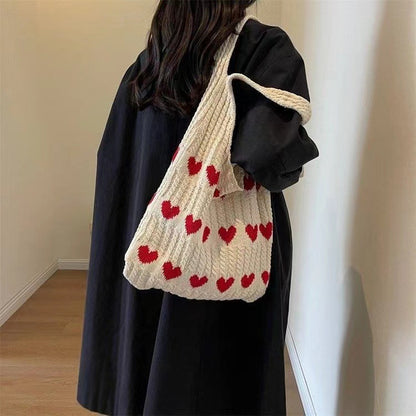  "Chic Heart-shaped Knitted Woven Shoulder Bag – Elevate your style with this trendy side bag."