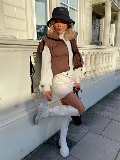 Chic puffer vests for warmth and style—available now in-store. image 3