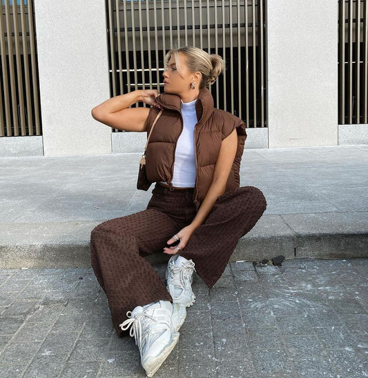 Chic puffer vests for warmth and style—available now in-store. image 2