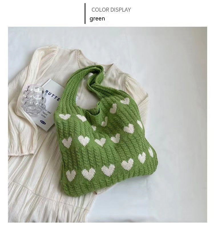 "Chic Heart-shaped Knitted Woven Shoulder Bag – Elevate your style with this trendy side bag."