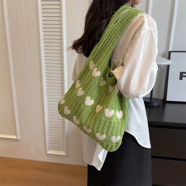  "Chic Heart-shaped Knitted Woven Shoulder Bag – Elevate your style with this trendy side bag."