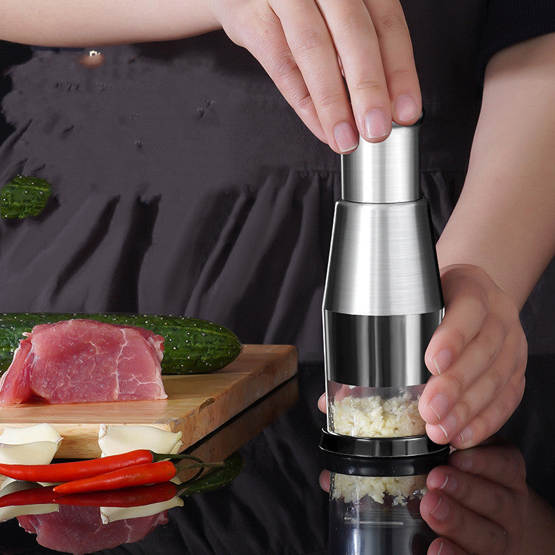"Effortless garlic prep: Our kitchen chopper, the perfect garlic clove crusher for gourmet delights."
