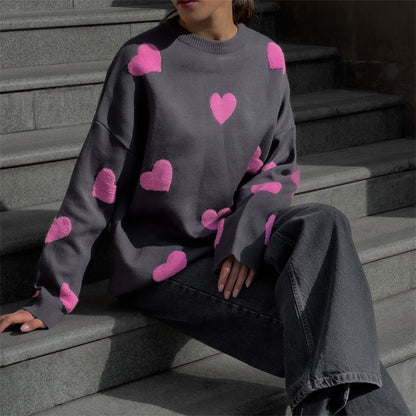 "Valentine's Day Heart Sweater - Women's cozy fashion for celebrating love. Available now in-store!"