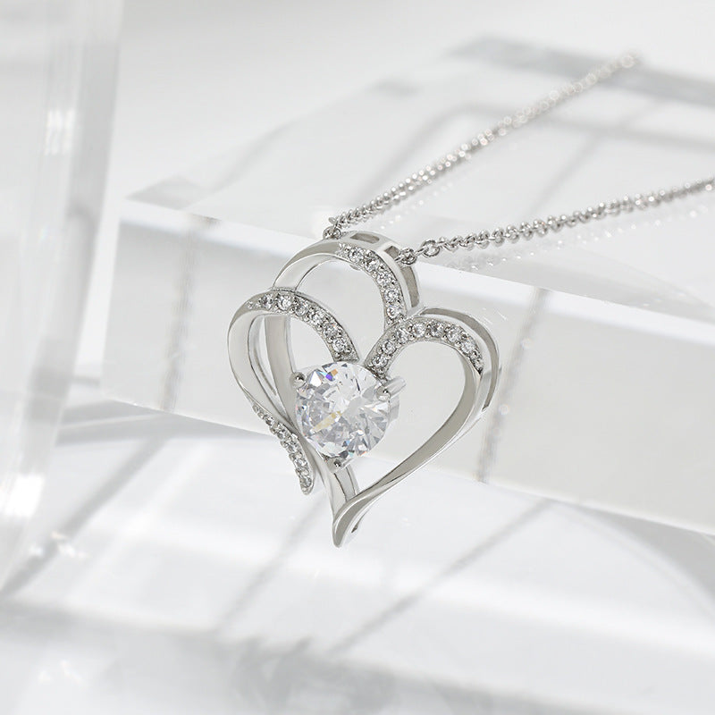 "Dazzling Zircon Double Love Necklace – Rhinestone-inscribed, personalized heart pendant. Perfect Valentine's Day clavicle chain for women."