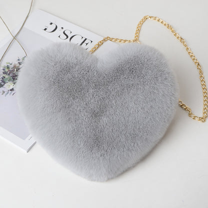 "Elevate your style: Love Bags for Women with plush design and chic chain shoulder strap. "image  10