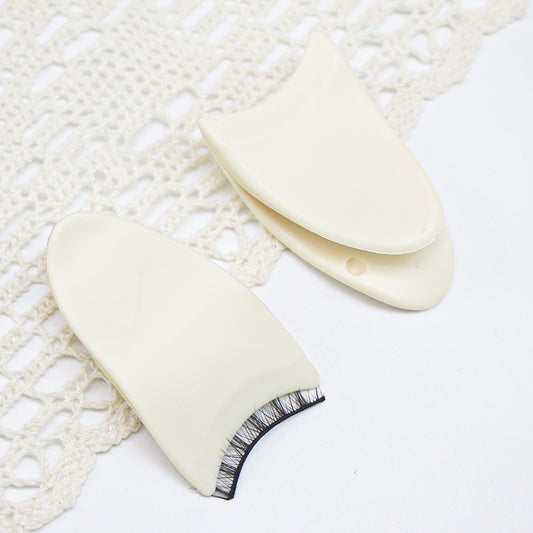 "Image: Plastic Eyelash Curler Stick and False Eyelash Curler Eyelash Aid available in store - find the best eyelash curler for flawless lashes!"