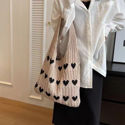  "Chic Heart-shaped Knitted Woven Shoulder Bag – Elevate your style with this trendy side bag."
