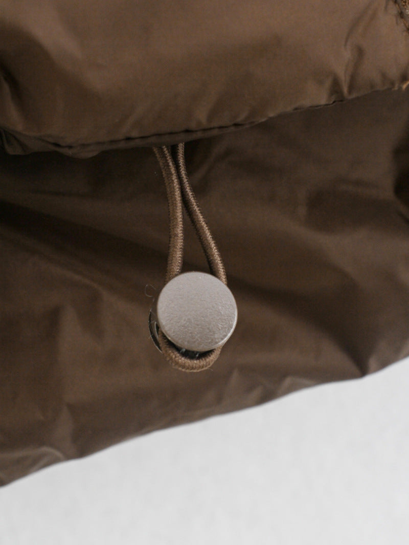 Chic puffer vests for warmth and style—available now in-store. image 5