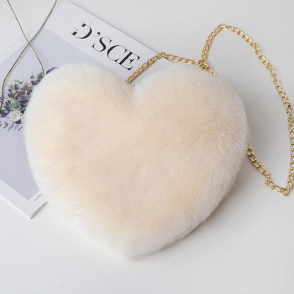 "Elevate your style: Love Bags for Women with plush design and chic chain shoulder strap. "image 6