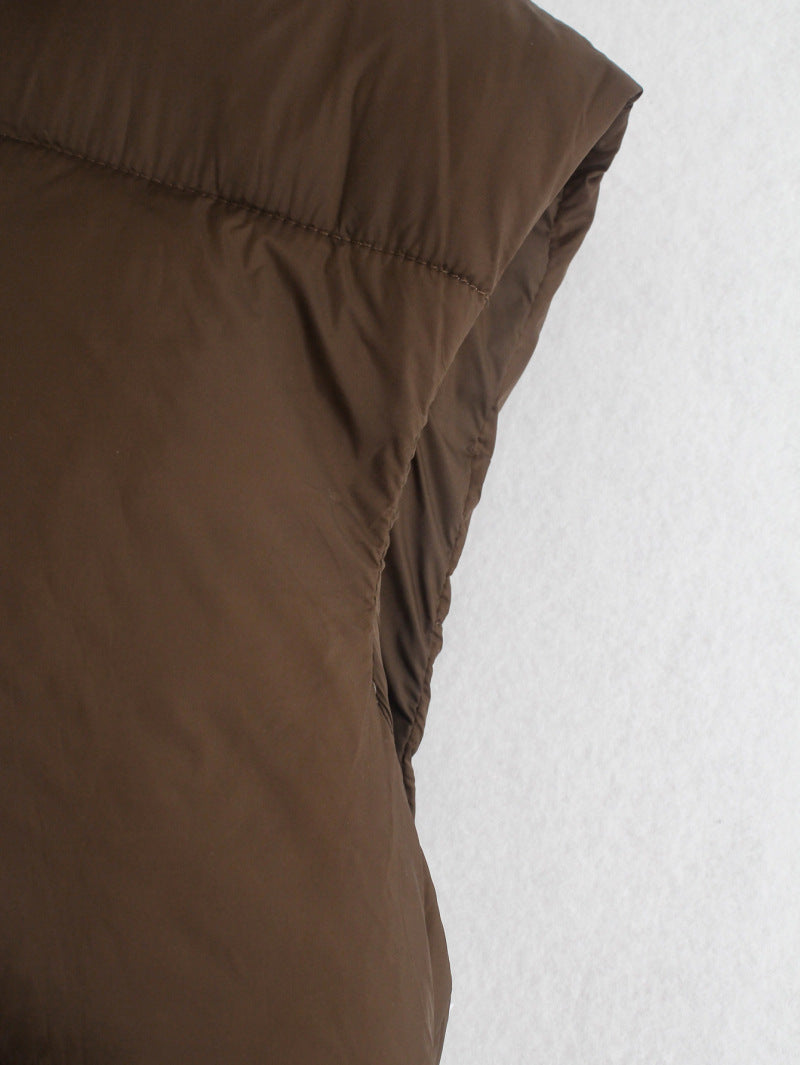 Chic puffer vests for warmth and style—available now in-store. image 6